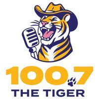 100.7 The Tiger logo