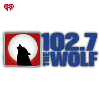 102.7 The Wolf logo