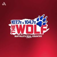 107.7 and 104.7 The Wolf logo